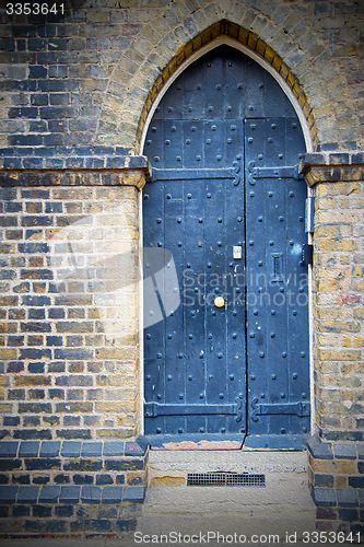 Image of wooden parliament in london old church door and marble antique  