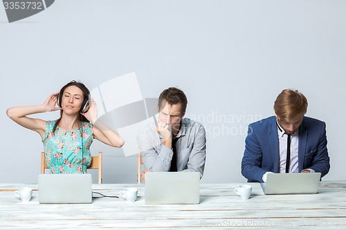 Image of Business team working on their business project together at office