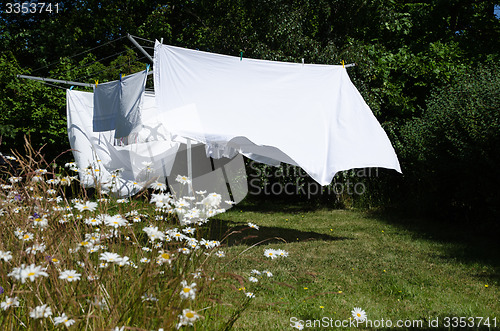 Image of Drying white sheets