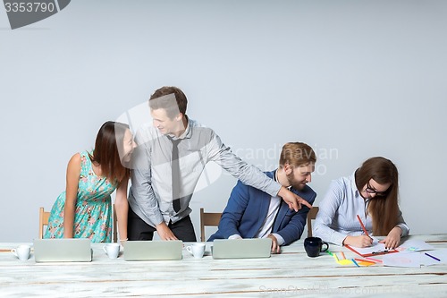 Image of Business team working on their business project together at office