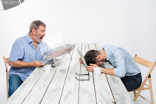 Image of The two colleagues working together at office on white background