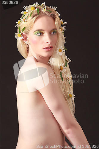 Image of Naked Pretty Woman with Flowers on her Blond Hair