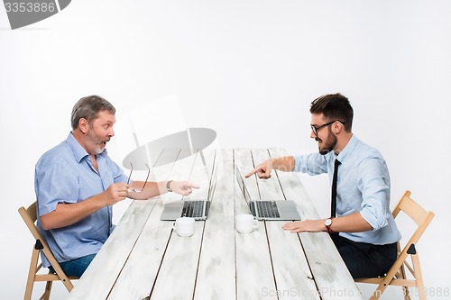 Image of The two colleagues working together at office on white background