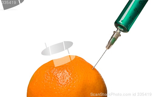 Image of Glass syringe and orange
