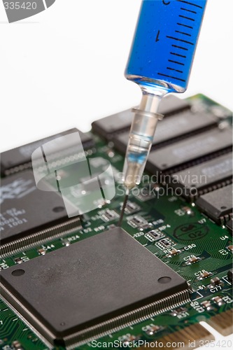 Image of Glass syringe and circuit board