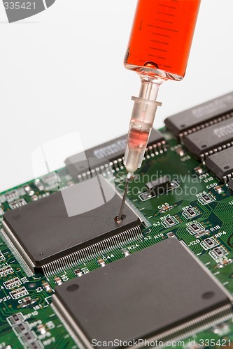 Image of Glass syringe and circuit board