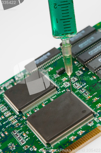 Image of Glass syringe and circuit board