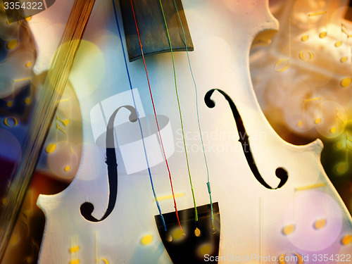 Image of White violin with bokeh