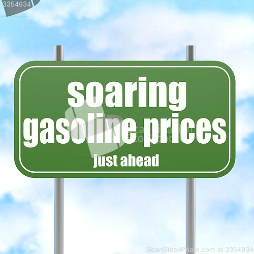 Image of Green road sign with soaring gasoline prices word