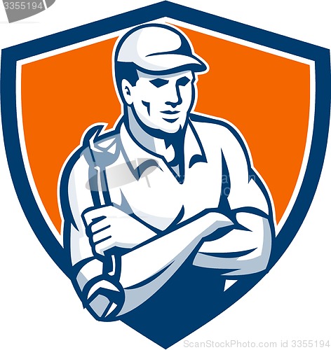 Image of Mechanic Holding Spanner Arms Crossed Shield Retro