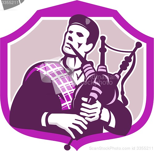 Image of Scotsman Playing Bagpipes Shield Retro