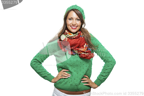 Image of Cute sexy young woman in a green winter outfit