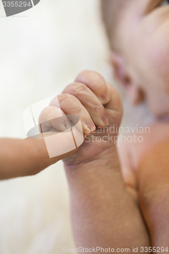 Image of Tender love of a newborn infant