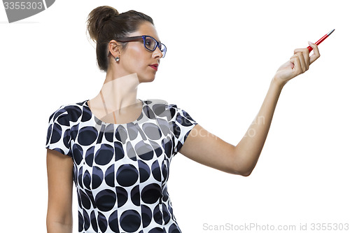 Image of Serious Woman in a Dress Holding Ballpoint Pen