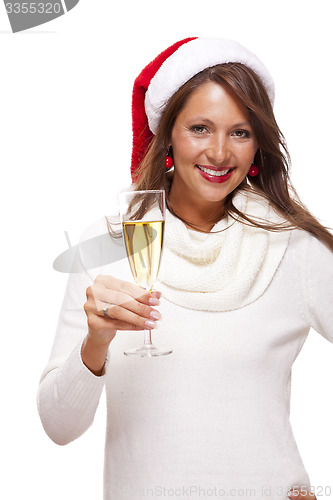 Image of Playful woman celebrating Xmas blowing a kiss