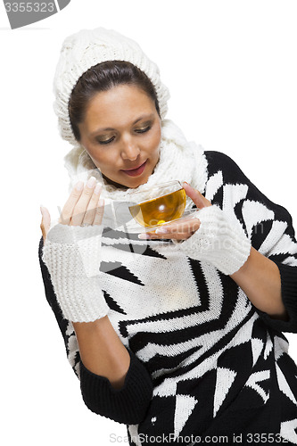 Image of Elegant woman in a black and white winter outfit