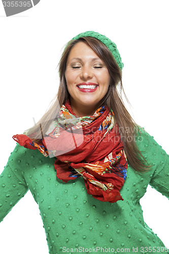 Image of Cute sexy young woman in a green winter outfit