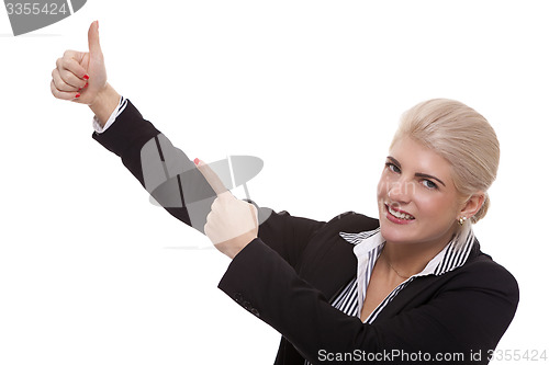 Image of Businesswoman Pointing Up While Looking at Camera