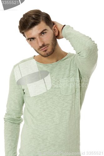 Image of young man in casual fashion on white