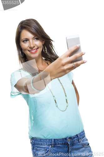 Image of Pretty Happy Woman Holding a Mobile Phone