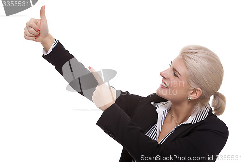 Image of Businesswoman Pointing Up While Looking at Camera