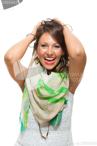 Image of Laughing Pretty Woman Holding Back her Hair