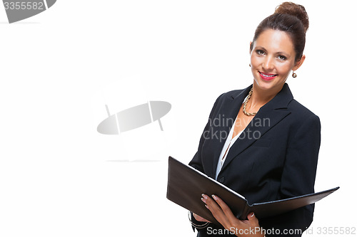 Image of Smiling Pretty Businesswoman Holding a File Folder