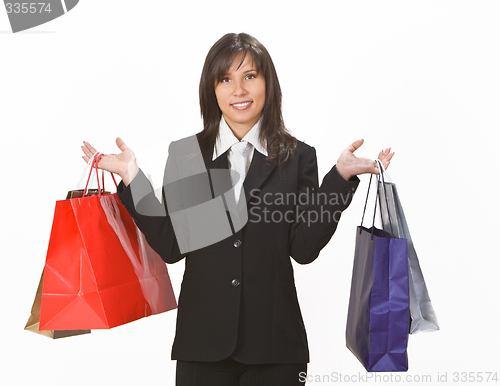 Image of Smiling woman with shopping bags