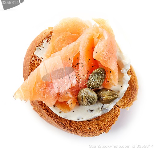 Image of toasted bread with salmon and capers