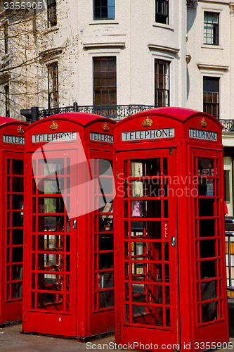 Image of telephone in england london obsolete box classic british icon