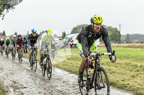 Image of The Cyclist Matteo Tosatto on a Cobbled Road - Tour de France 20