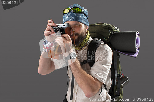 Image of tourist with camera
