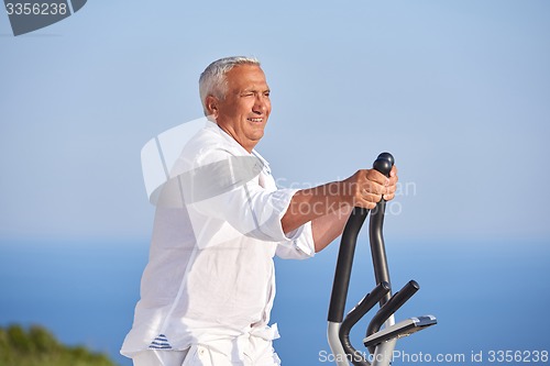 Image of healthy senior man working out