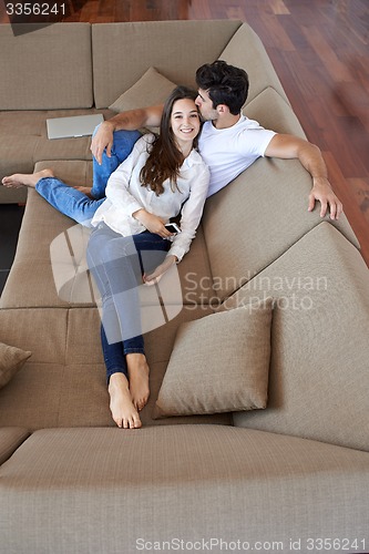 Image of happy young romantic couple have fun and  relax at home indoors