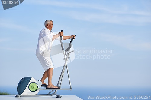 Image of healthy senior man working out