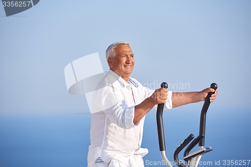 Image of healthy senior man working out