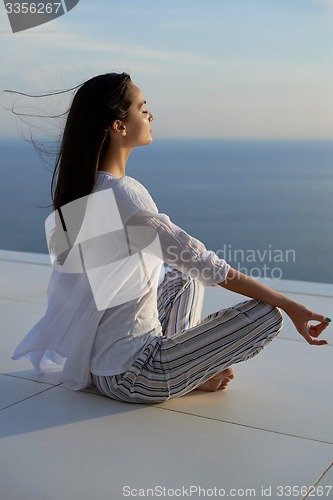 Image of young woman practice yoga