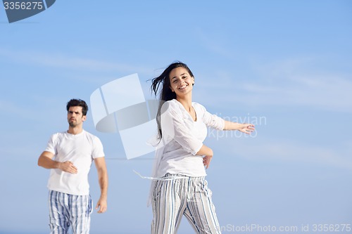 Image of happy young romantic couple have fun and  relax at home