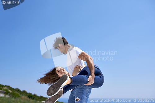 Image of happy young romantic couple have fun and  relax at home