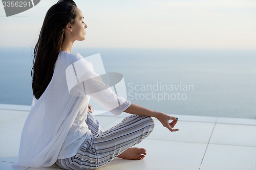 Image of young woman practice yoga