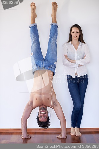 Image of happy young romantic couple have fun and  relax at home indoors