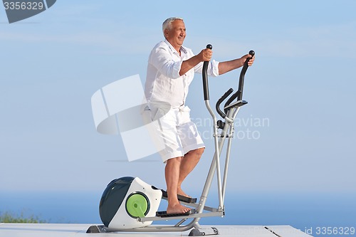 Image of healthy senior man working out