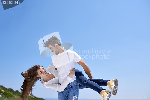 Image of happy young romantic couple have fun and  relax at home