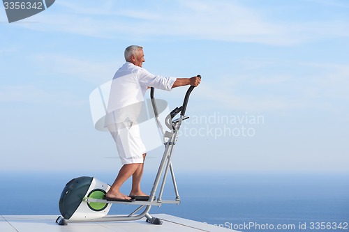 Image of healthy senior man working out