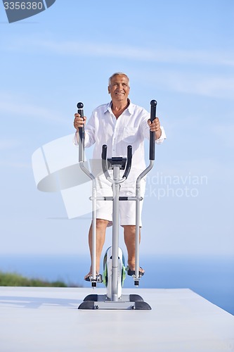 Image of healthy senior man working out