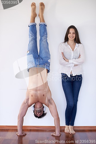 Image of happy young romantic couple have fun and  relax at home indoors