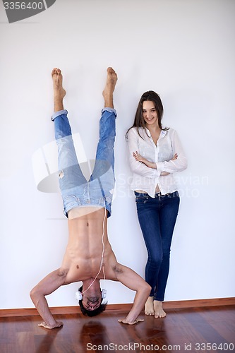 Image of happy young romantic couple have fun and  relax at home indoors