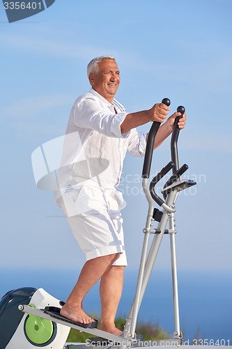 Image of healthy senior man working out