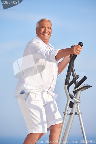 Image of healthy senior man working out