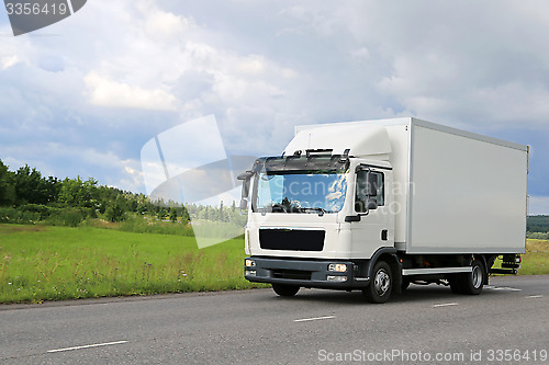 Image of White Commercial Delivery Truck on the Road